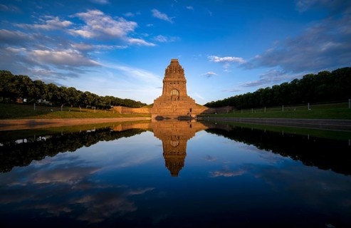 Monument to the Battle of the Nations, reflection in the lake, evening mood, Leipzig, Saxony,