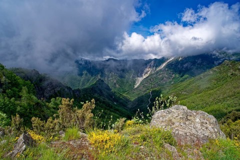Mountain panorama from Passo Croce in the Garfagnana mountain landscape to the cloudy peaks of the