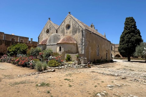 View of rear wall of double-nave church building Church of Arkadi Monastery with double apse in