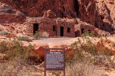 Sign tells the history of The Cabins built by the Civilian Conservation Corps in the 1930s at