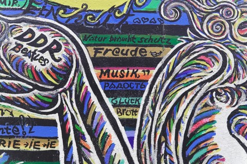 Graffiti on the Berlin Wall in the East Side Gallery, Berlin, Germany, Europe, Colourful graffiti