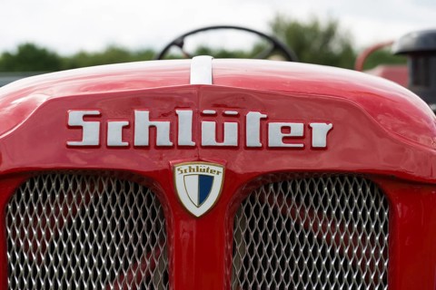 Schlueter tractor, lettering and company logo on red painted bonnet, Offenbach, Dreieich, Hesse,