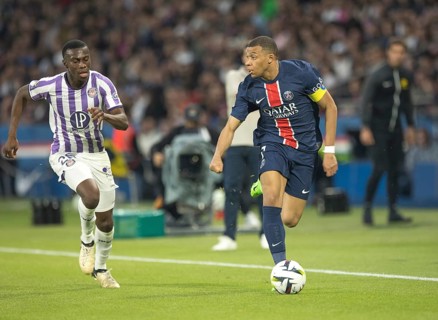 Football match, captain Kylian MBAPPE' Paris St. Germain running on the ball looking left, Kevin