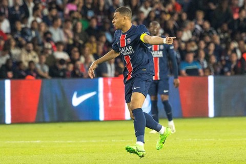 Football match, captain Kylian MBAPPE' Paris St. Germain indicates the direction of the upcoming