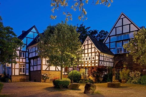 Five-gabled corner, architectural monument in the evening, half-timbered houses in the Freiheit Alt