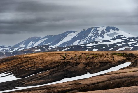 Volcanic landscape with hills and snow, Laugavegur trekking trail, Landmannalaugar, Fjallabak