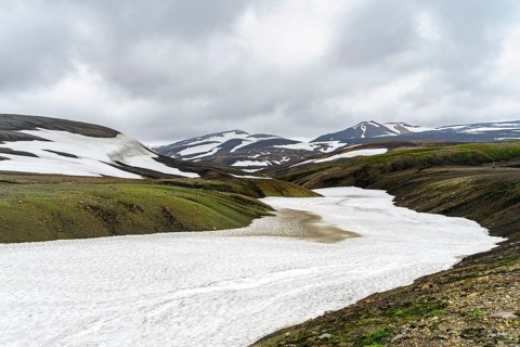 Colourful volcanic landscape with hills and snow, Laugavegur trekking trail, Landmannalaugar,