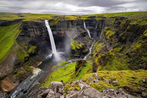 River and waterfalls at a canyon with green moss, Haifoss and Granni waterfall at a canyon, Fossá í