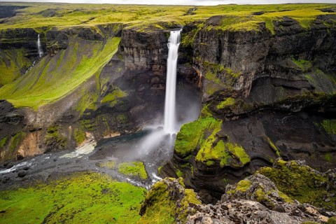 River and waterfalls at a canyon with green moss, Haifoss and Granni waterfall at a canyon, Fossá í
