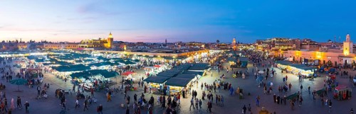 Marrakech, Morocco, March 27, 2018: Panoramic high angle dusk view over Jemaa El-Fna square at