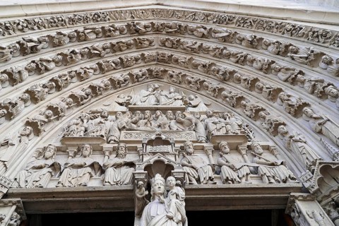 Detail of the main portal of Notre Dame Cathedral, Paris, FranceParis, France, Europe. Complex