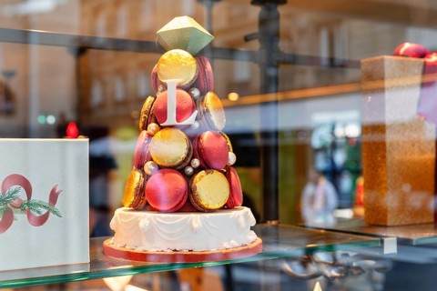 Macarons in the shop window of the pastry shop Laduree, Saint-Germain-des-Pres, Paris, Ile de