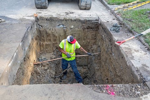 Detroit, Michigan, Workers replace old lead water service lines with copper pipes. Lead is harmful