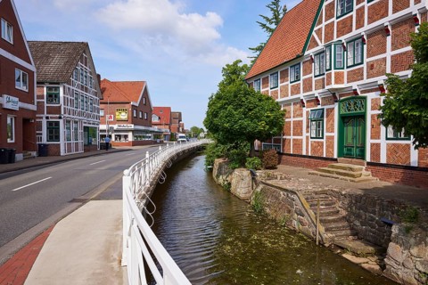 Street and stairs from the ditch Jorker Hauptwettern to the town hall in Jork, Altes Land, district