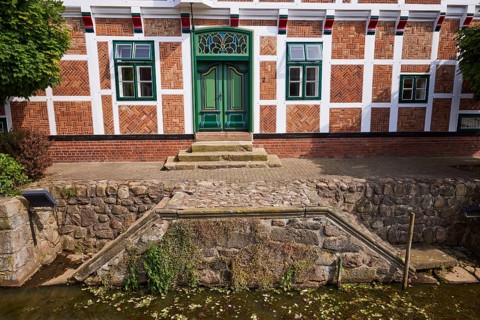 Stairs from the Jorker Hauptwettern moat to the town hall in Jork, Altes Land, Stade district,