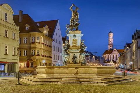 De Vries Sklupturen Herkulesbrunnen illuminated Augsburg Germany