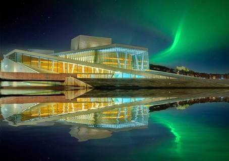 Opera illuminated night northern lights reflection Oslo Norway