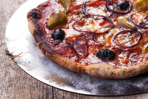 Pizza with ham and olives