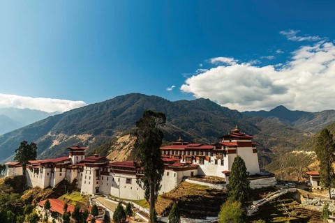 View of the Trongsa Dzong on a sunny day with blue sky