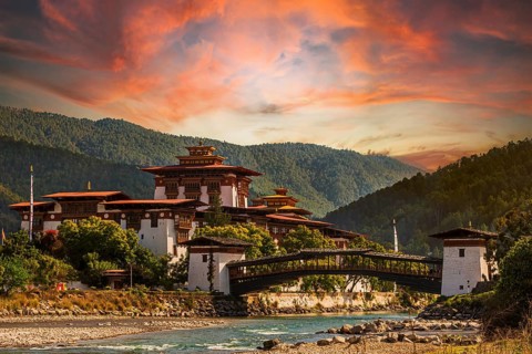 Punakha Dzong at sunset with the Mo Chhu river in Bhutan