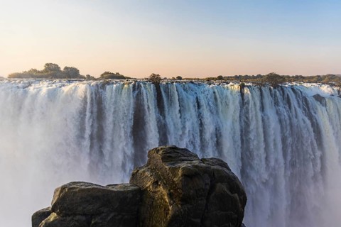 Close-up of the mighty Victoria Falls waterfall in Matabeleland on a late afternoon