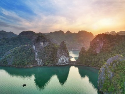 Ha Long Bay in Vietnam, a UNESCO World Heritage Site at sunset in an aerial view
