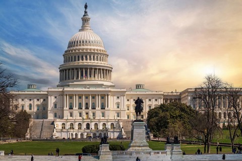 The United States Capitol building at sunset