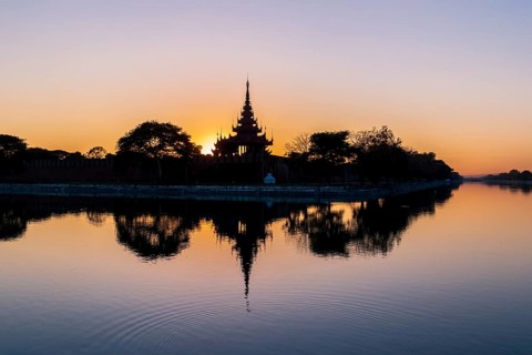 Pagoda silhouette during a sunset in Mandalay, Myanmar (Burma)