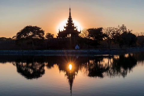 Pagoda silhouette during a sunset in Mandalay, Myanmar (Burma)