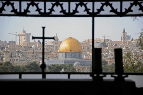 Cityspape of Jerusalem through a window of a church