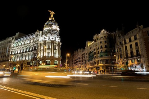 Alcala and Gran Via street in Madrid night city lights