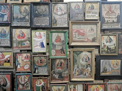 Votive pictures, votive tablets on the walls of the chapel of grace inside the church, pilgrimage