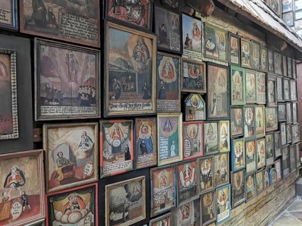Votive pictures, votive tablets on the walls of the chapel of grace inside the church, pilgrimage