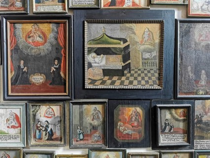Votive pictures, votive tablets on the walls of the chapel of grace inside the church, pilgrimage