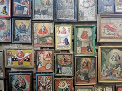 Votive pictures, votive tablets on the walls of the chapel of grace inside the church, pilgrimage