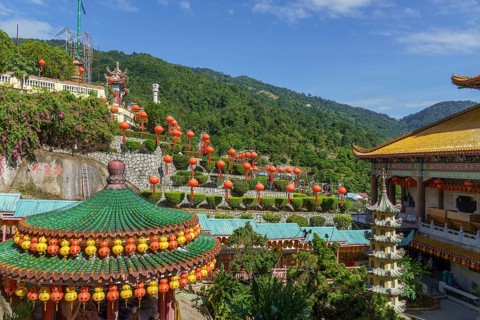 Chinese temple with lanterns and views of green hills and mountains, Pattaya, Thailand, Asia