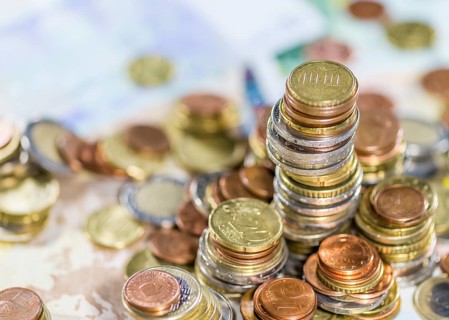 Stacked Euro Coins (on Banknotes) as detailed close-up shot