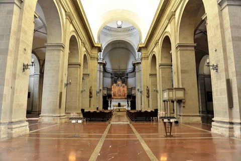 Montepulciano, Tuscany, Italy, Europe, A wide church interior with marble floor, large columns and