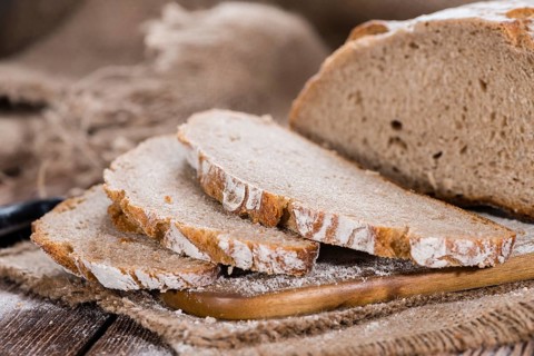 Fresh baked Loaf of Bread (as detailed close-up shot)
