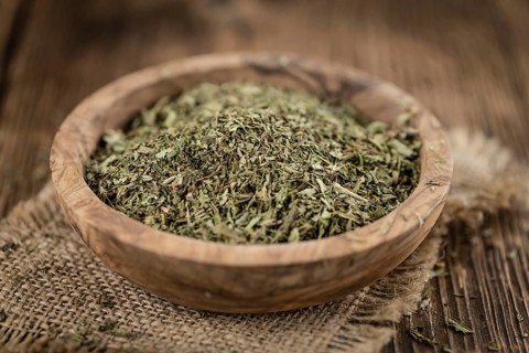 Dried Stevia leaves (selective focus) on vintage background