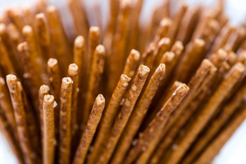 Salt Sticks (close-up shot) on bright wooden background