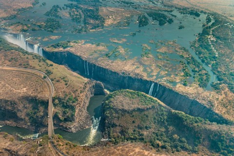 Victoria Falls at drought near Livingstone, Zimbabwe, as aerial shot made from a helicopter, Africa