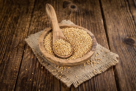 Mustard Seeds on a vintage background as detailed close-up shot (selective focus)
