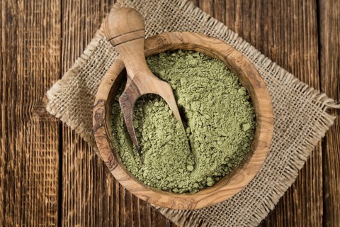 Stevia Powder on an old wooden table (close-up shot)