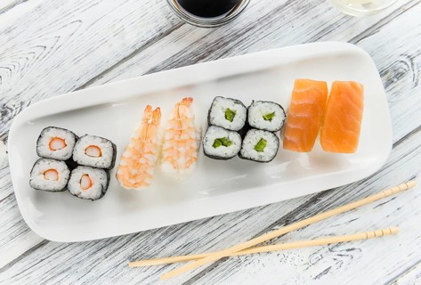 Some fresh made Sushi (detailed close-up shot, selective focus)