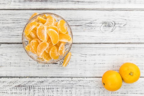 Portion of raw tangerines as detailed close-up shot (selective focus)