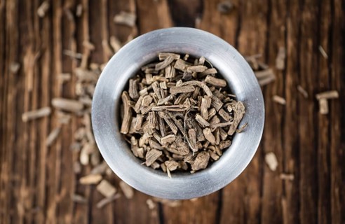 Valerian Roots on a wooden table (detailed close-up shot)