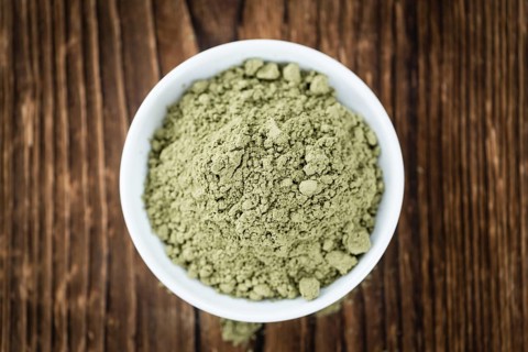 Stevia Powder on an old wooden table (close-up shot)
