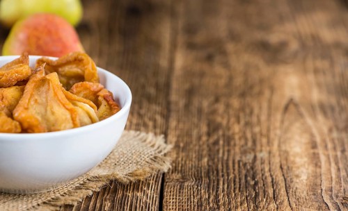 Bowl with dried Pears (close-up shot, selective focus)