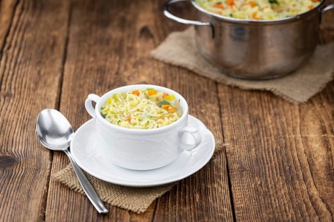 Portion of fresh made Alphabet Soup (selective focus, close-up shot)